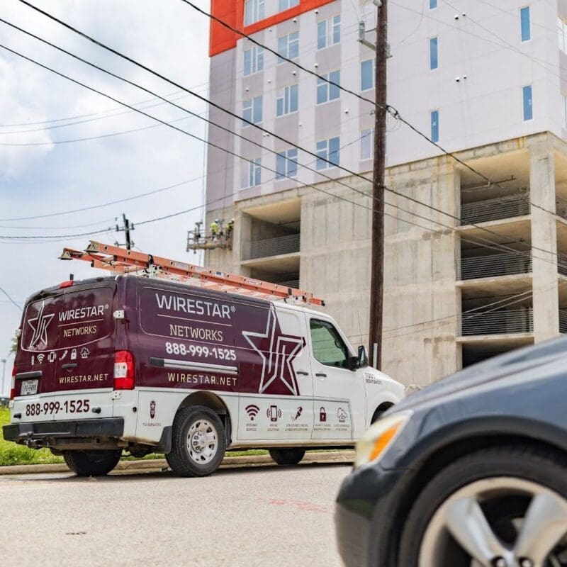 If you’ve ever been frustrated by a dead zone or experienced painfully slow internet during a video call, these are signs that your building’s wireless network might not be doing its job, and it's often because it was set up without a proper Wi‑Fi analysis. Whether you’re supporting a hybrid work-from-home setup, running smart devices, or just need stable internet for day-to-day operations, your wireless infrastructure needs to perform without hiccups. This starts with a solid foundation. So, let’s talk about why Wi‑Fi surveys are essential for high-performance building networks and what you need to know before setting up or upgrading your wireless system. What is a Wi‑Fi Site Survey? A Wi‑Fi site survey is like the blueprint for your wireless network. It’s a detailed assessment of your physical space, taking into account walls, windows, materials, interference sources, and more, to figure out the best access point placement and network configuration. There are three main types: Passive surveys: Measure signal strength and interference. Active surveys: Test the real-time performance of your network. Predictive surveys: Use floor plans and software to simulate your network before it’s built. Each one plays a different role, but all aim for the same goal: uninterrupted, fast, and reliable Wi‑Fi. Why You Shouldn’t Skip a Wi‑Fi Survey Before Installation Guessing where to put your access points is a bad idea. Here’s why skipping a survey can backfire: Poor Coverage & Frustrated Users Without proper planning, you’ll end up with dead zones where signal drops or over saturation with too many Wi-Fi access points. Employees, customers, or residents will struggle to stay connected, and that’s a surefire way to kill productivity or damage your reputation. Slow Speeds & Bottlenecks Even if your network seems fine, poor placement can create overloaded zones. If too many people are connected to the same access point, speeds will tank. A site survey ensures even distribution of coverage and bandwidth. More Maintenance (And Cost) Later Fixing a broken network is more expensive than getting it right from the start. Surveys help you avoid costly rewiring, reconfiguring, and unnecessary hardware purchases. How Wi‑Fi Surveys Improve Office & Building Network Performance If you’re managing a multi-floor office, MDU, campus, or commercial building, there are even more reasons to prioritize a professional Wi‑Fi survey. Maximized Signal Strength and Coverage Survey tools help map out signal heatmaps, showing exactly where coverage is strong or weak. This allows for optimized access point placement, reducing interference and overlap. Faster Connection Speeds By identifying interference from walls, windows, other networks, and even elevators or microwave ovens (yes, really), surveys help configure the cleanest, most efficient channel usage. That means faster speeds for everyone. Seamless Roaming for Mobile Users A well-surveyed network ensures that users moving through a building won’t experience dropped connections. Think of warehouse workers with tablets, hospital staff with mobile devices, or office employees jumping into Zoom calls while walking between meetings. Because cellular 5G signals often don’t penetrate buildings well, many cell phones rely heavily on Wi-Fi calling when indoors, making a strong, consistent wireless network even more critical. When Is the Best Time to Get a Wi‑Fi Survey? Timing matters. Here are three scenarios where a survey is critical: Before a New Network Installation If you’re building a new space, don’t install your Wi‑Fi blindly. A predictive site survey will help you plan around building materials and layout quirks before the first cable is laid. When Upgrading an Old Network Wi‑Fi standards and user demands change quickly. If your network is more than 3–5 years old, it’s probably due for a refresh. A survey will show where performance is lagging and where upgrades are needed. After Major Layout or Staff Changes Did you renovate the space? Add new departments or workstations? Bring in new devices? All of these changes affect how your network performs. A survey can help recalibrate things for optimal performance. Wi‑Fi Surveys for Buildings: What Owners Want to Know You’re not a network engineer, and that’s okay. What you really care about is that your internet works. So here’s what a proper Wi‑Fi survey gives you: A network tailored to your building’s layout Stable and fast internet connections in every corner Fewer complaints from employees or residents Less downtime and fewer service calls The confidence that your tech investments are being used to their full potential And if you’re in a high-density environment like apartment communities, hospitals, hotels, or educational facilities, this kind of planning isn’t just helpful, it’s essential. Optimizing Home Wi‑Fi: Why Surveys Aren’t Just for Businesses For home users, a Wi‑Fi survey might seem like overkill, but if you’re working remotely, streaming 4K movies, gaming online, or managing dozens of smart devices, it can make a huge difference. A survey helps ensure you’re getting the speeds you’re paying for, with no buffering in the living room or dead zones in the back bedroom. Whether you're in a large multi-story home or a compact apartment surrounded by neighboring networks, a proper setup can mean the difference between constant frustration and a smooth, seamless online experience. Choosing the Right Partner for Your Wi‑Fi Survey Make sure you’re working with a team that: Uses enterprise-grade tools Offers on-site and predictive survey options Provides detailed reports with heatmaps and recommendations Knows how to support your unique business type and network needs At WireStar Networks, we help businesses design wireless networks that perform. Our experienced team takes the time to understand your space, your needs, and your future growth plans. Don’t Leave Your Wi‑Fi to Chance Think of your wireless network like the plumbing in your building; you don’t notice it when it’s working well, but when it’s bad, everything grinds to a halt. A professional Wi‑Fi site survey might not be the flashiest part of your tech stack, but it’s one of the most important steps in building a fast, reliable, and scalable network. Don’t guess. Plan it right from the start. Need help optimizing your wireless network? Contact us.